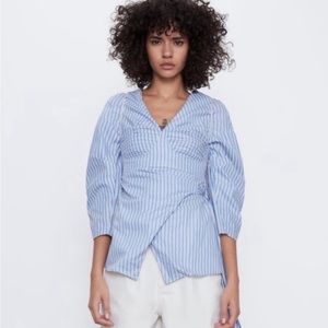 Two in one (shirt and bralette) “wrap around waist” shirt in blue stripes.